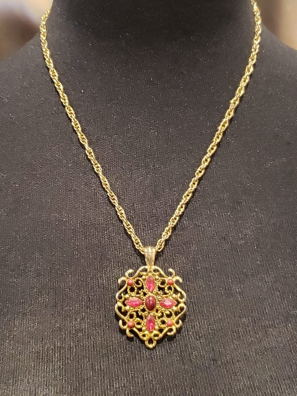 Gold-Tone Filigree Necklace with Reddish-Pink Stones
